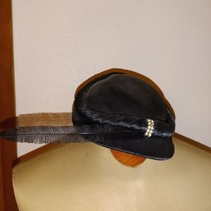 Vintage black hat with feather